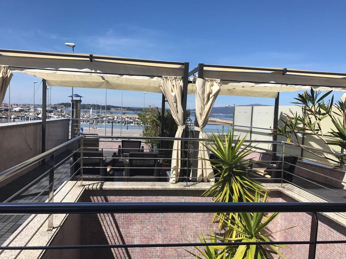 Apartamentos Puerto Basella Villanueva De Arosa Bagian luar foto